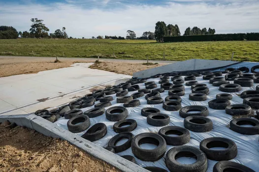 Silage bunker with concrete walls and drainage for effluent runoff