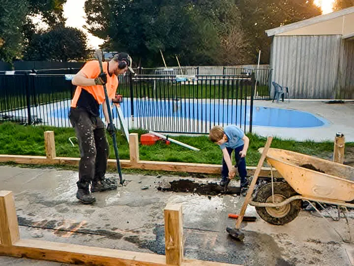 Builders concreting a new driveway