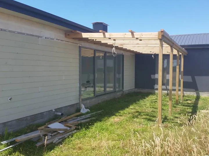 Construction by Manawatu builders creating a covered area outside door