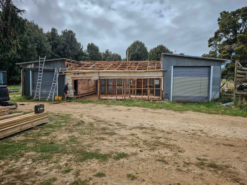 Demolition work for a workshop shed upgrade, taking down old roof from rural building