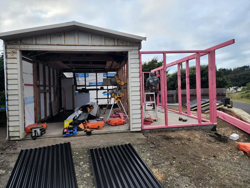 Framing in construction for a garage extension on a town property