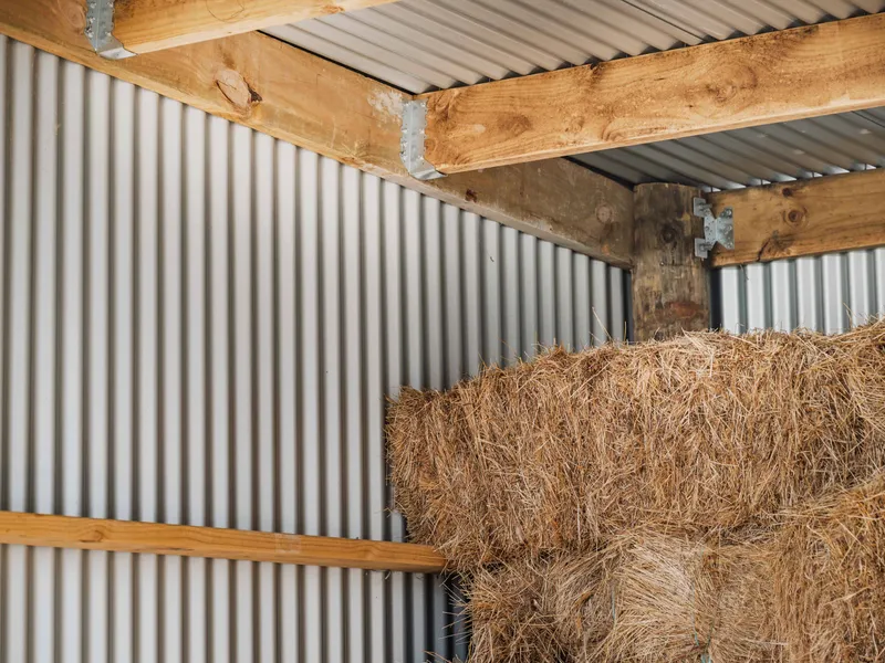 Hay shed storing square bales of hay