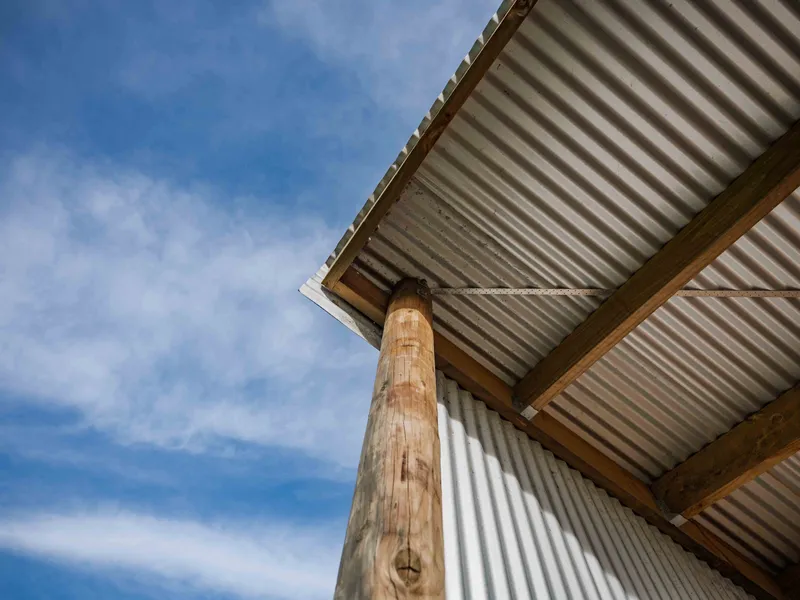 Corner of shed roof, with overhang