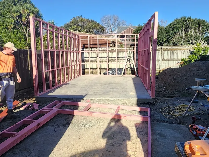 New residential shed in progress with a new concrete pad floor