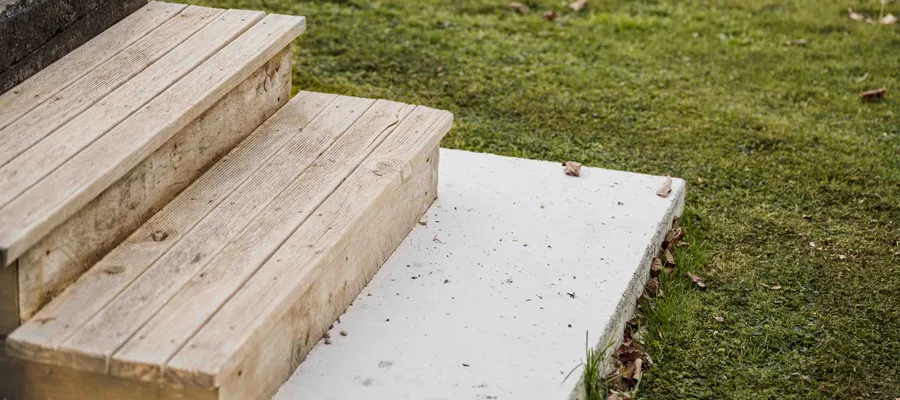 Garden steps with a concrete path to reduce mud high traffic areas in wet seasons