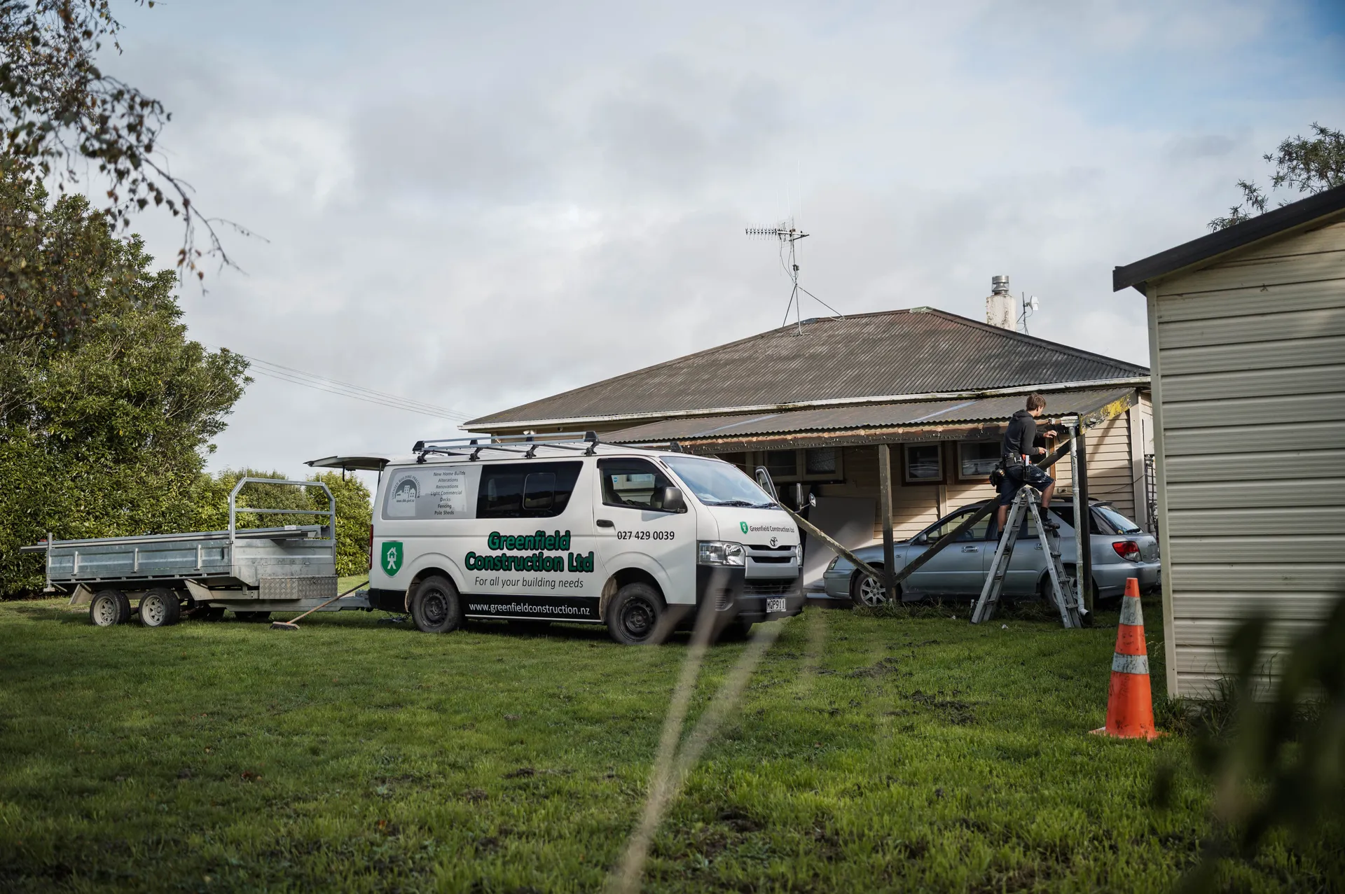 Greenfield construction van on site at a repair job at a residential property
