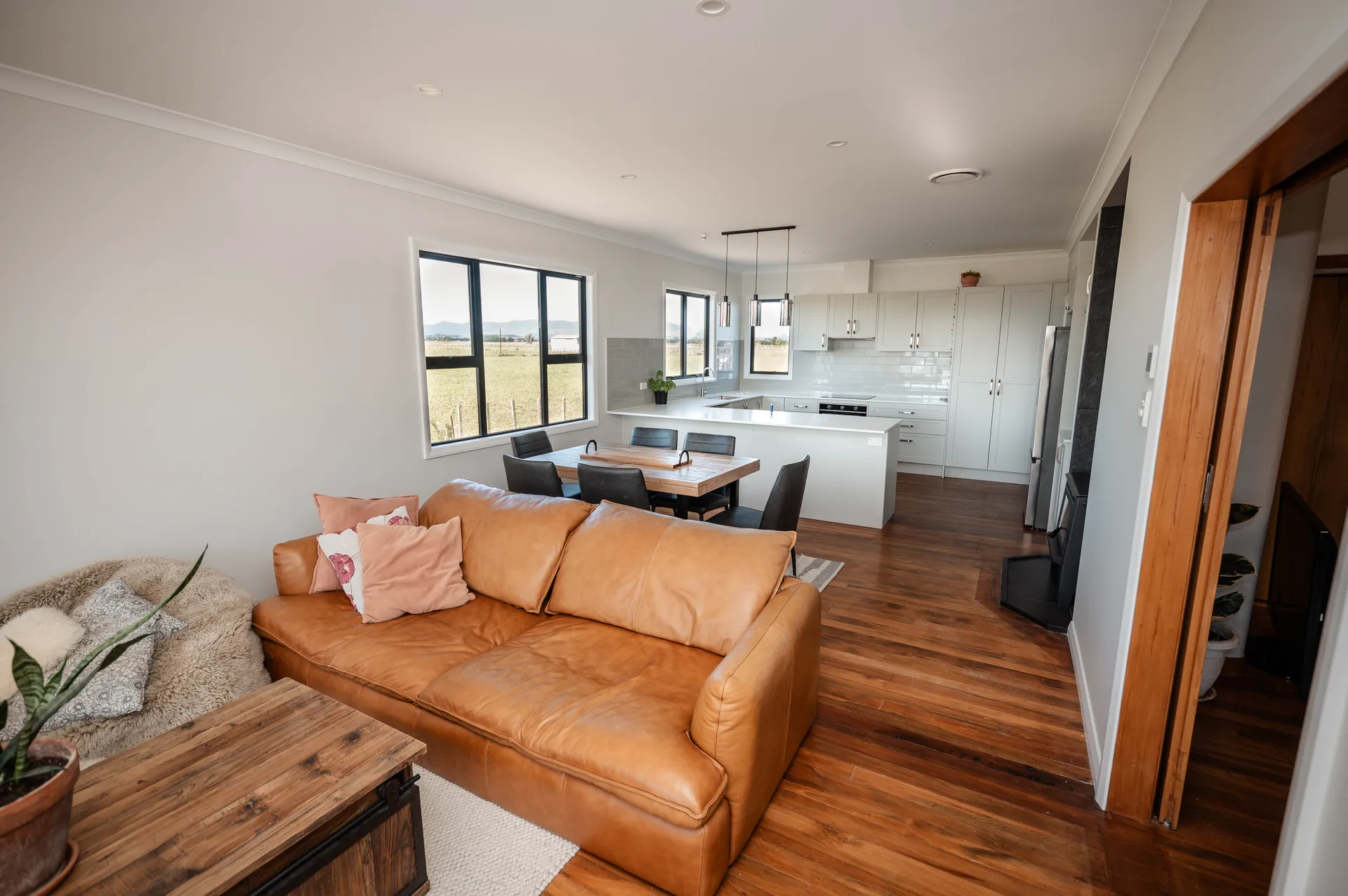 New living room space after a house renovation in Manawatu to refresh an outdated kitchen and living room