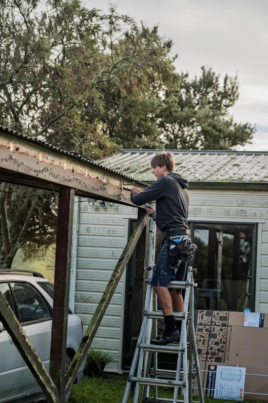 Construction team working on guttering replacement